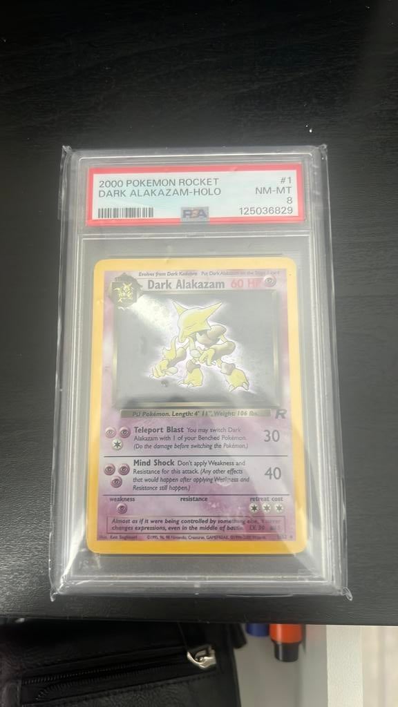 2000 Pokemon ROCKET DARK ALAKAZAM PSA 8, Ophalen of Verzenden, Zo goed als nieuw