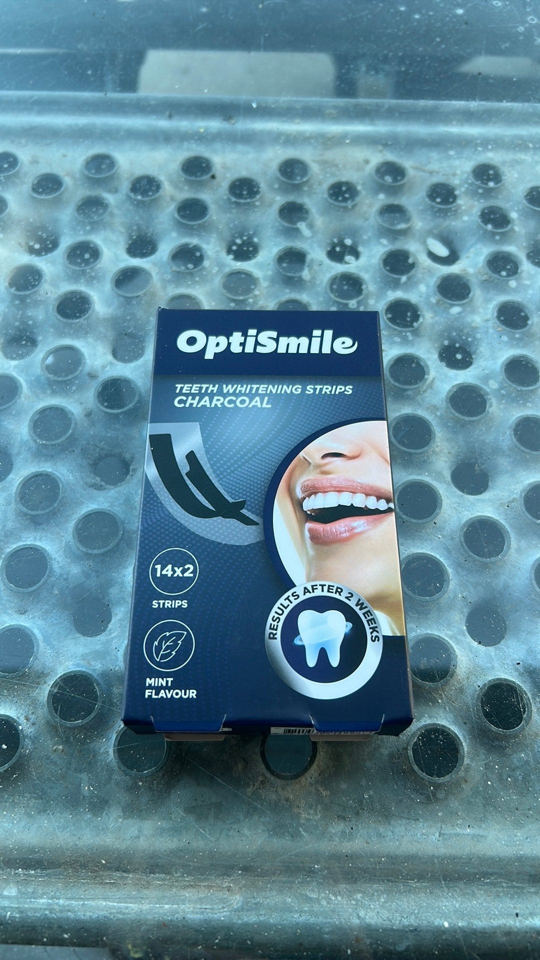 Action optismile, Verzenden, Zo goed als nieuw