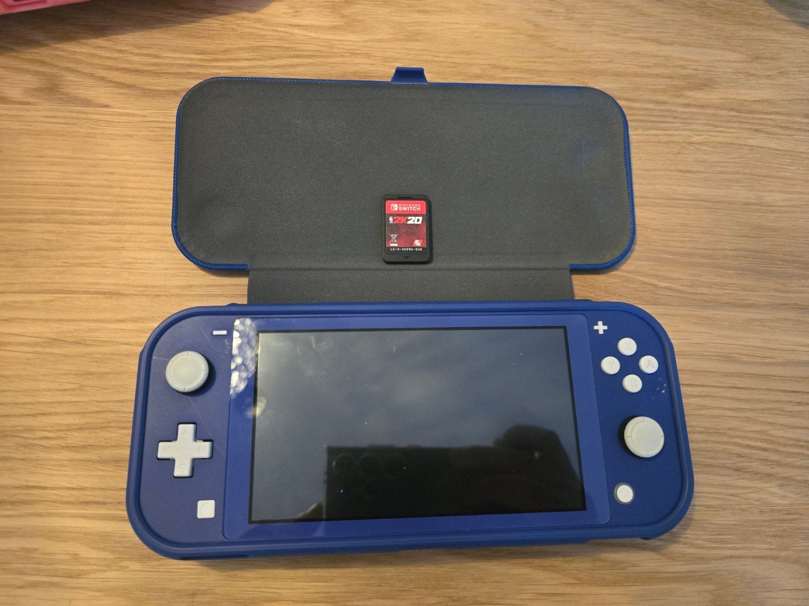 Nintendo Switch Lite met hoesje en game, Spelcomputers en Games, Spelcomputers | Nintendo Switch Lite, Ophalen of Verzenden, Overige kleuren
