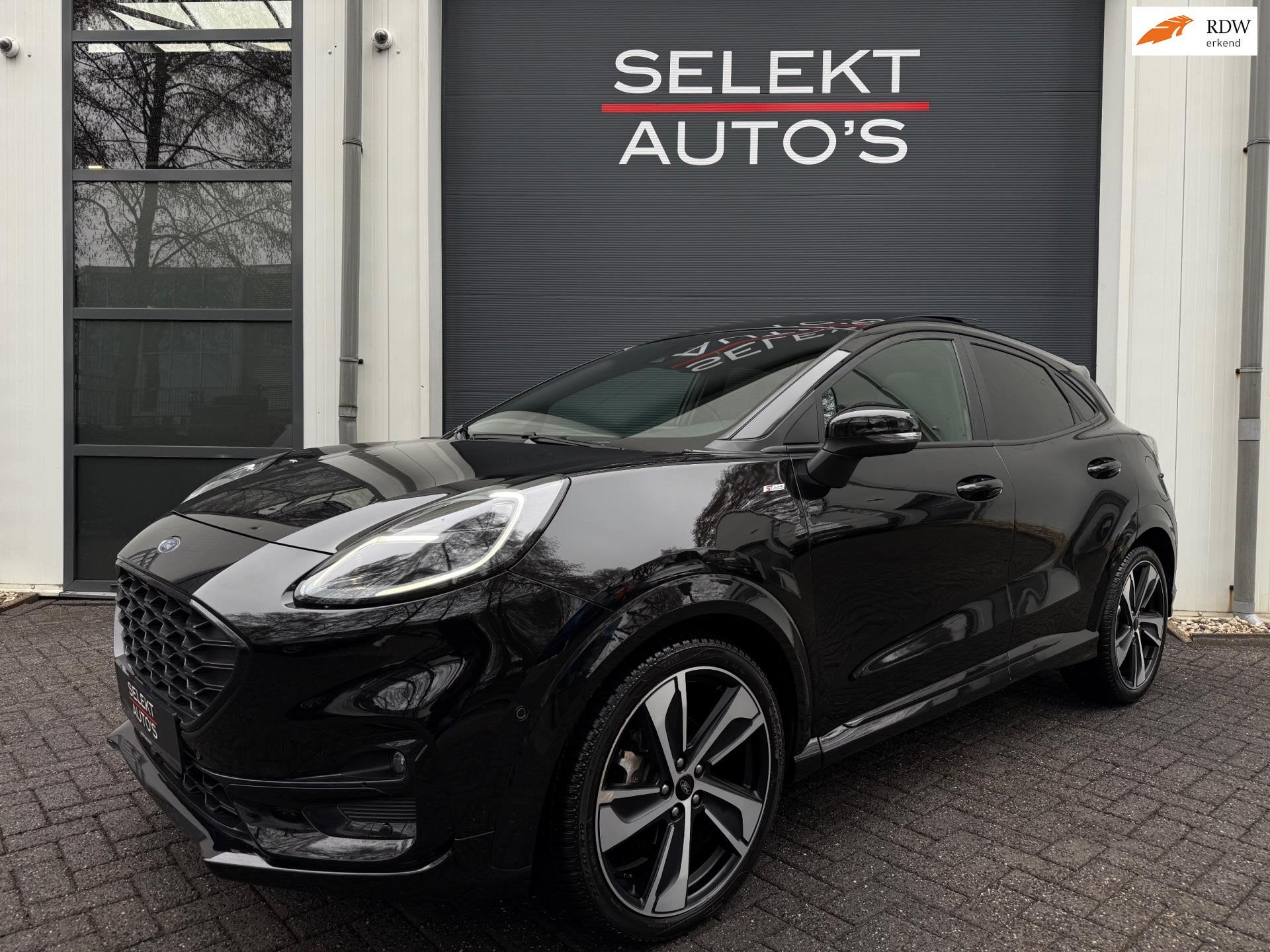 Ford Puma 1.0 EcoBoost Hybrid ST-Line X 125 Pk Pano/Navi/LED, Auto's, Voorwielaandrijving, 125 pk, Zwart, Leder en Stof