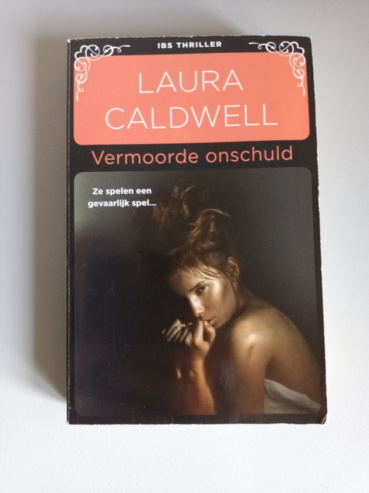 Laura Caldwell Vermoorde onschuld IBS thriller 109 Harlequin, Boeken, Ophalen of Verzenden, Gelezen, Laura Caldwell
