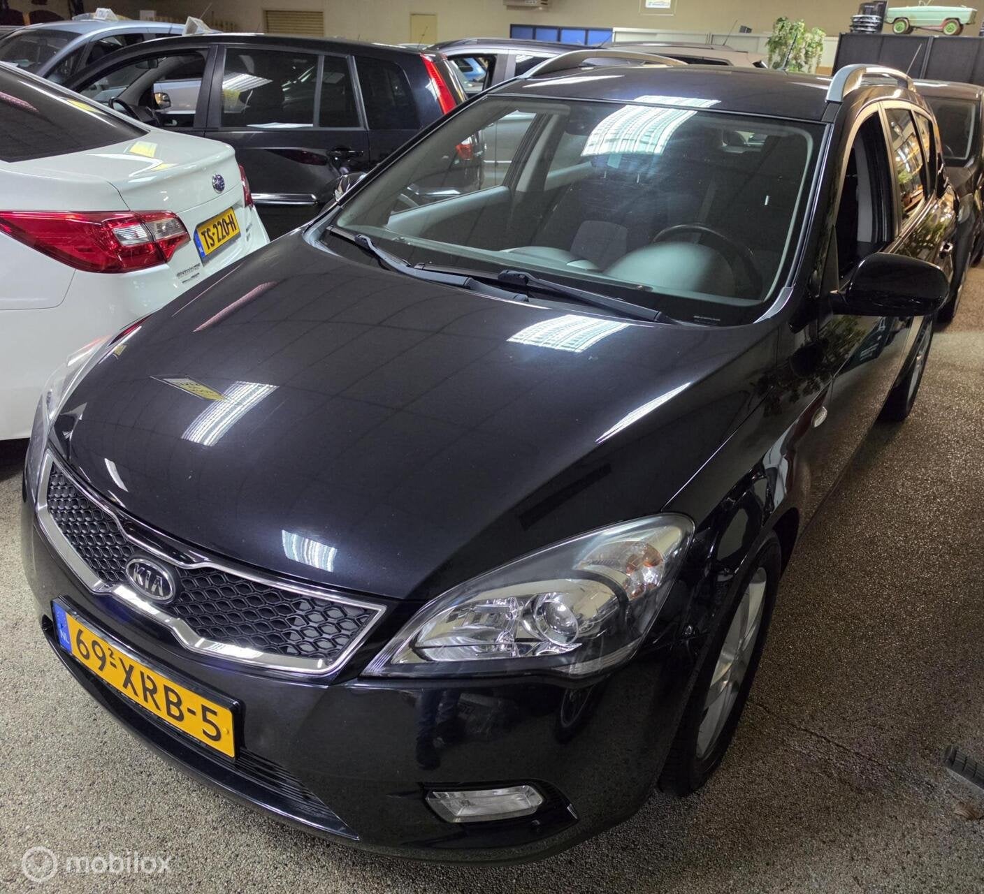 Kia cee'd Sporty Wagon 1.4 CVVT Navigator Plus Pack, Auto's, Voorwielaandrijving, Euro 5, Gebruikt, 4 cilinders