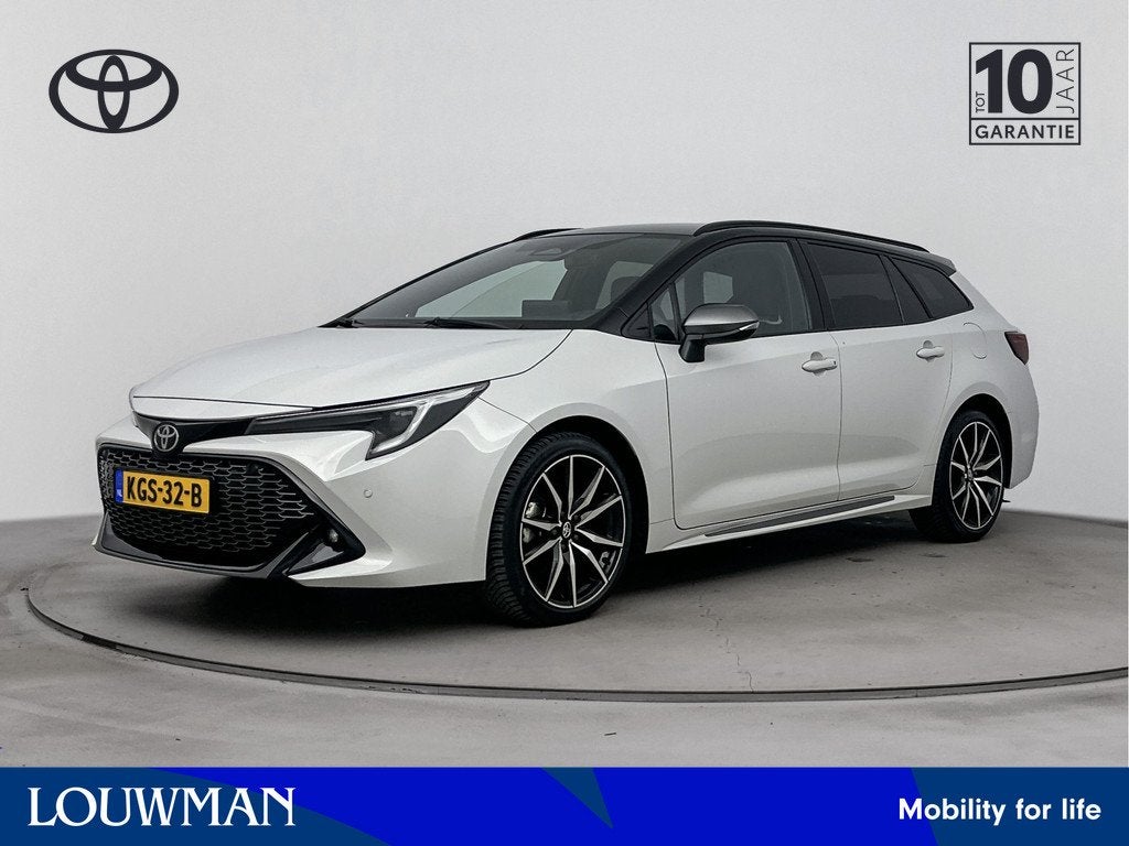 Toyota Corolla Touring Sports Hybrid 200 Business GR Sport P, Auto's, Toyota, 12 maanden, Gebruikt, 4 cilinders, 1415 kg
