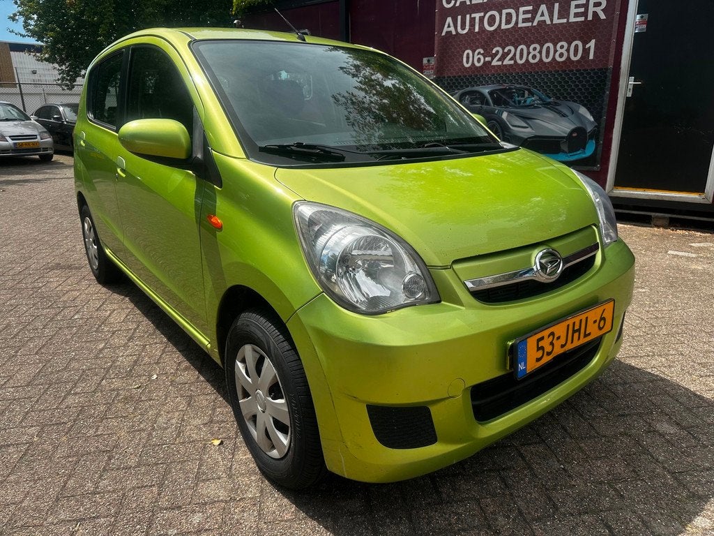 Daihatsu Cuore 1.0 Class Airco,cruise control,ele ramen, Auto's, Daihatsu, Voorwielaandrijving, 18 €/maand, 4 stoelen, Cuore