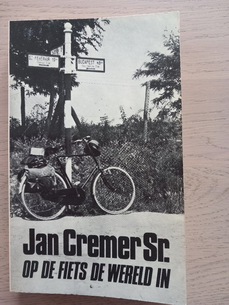 Boek Op de fiets de wereld in, Ophalen of Verzenden, Zo goed als nieuw, Nederland