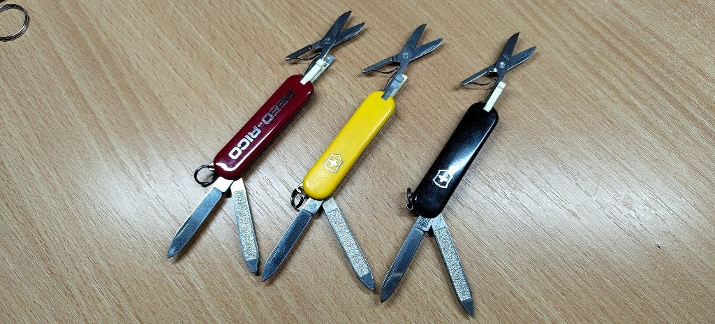 zakmes x3 Victorinox zwart/geel/rood, Verzenden, Gebruikt
