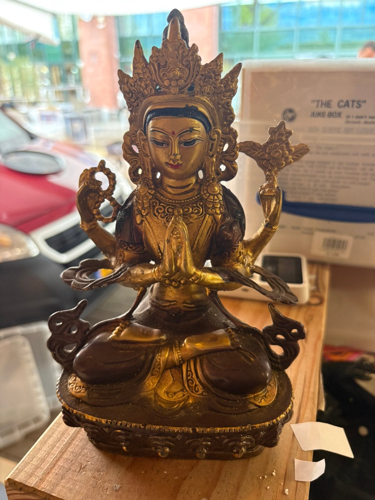 Bronzen budha beeld vuur verguld, Ophalen