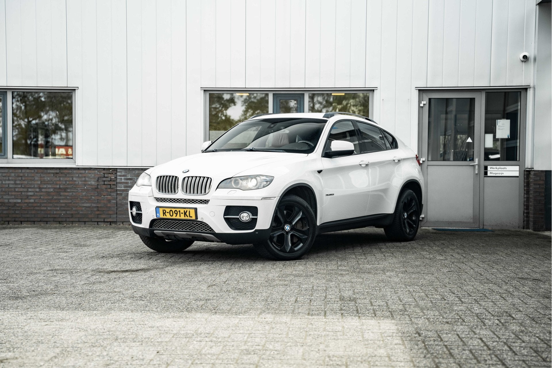 BMW X6 xDrive50i (bj 2008, automaat), 8 cilinders, Wit, Bedrijf, Vierwielaandrijving