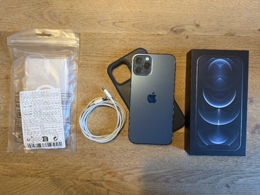 iPhone Pro 12 Pacific Blue + 2 (Nieuwe) hoesjes + toebehoren, Telecommunicatie, Mobiele telefoons | Apple iPhone, Blauw, 72 %