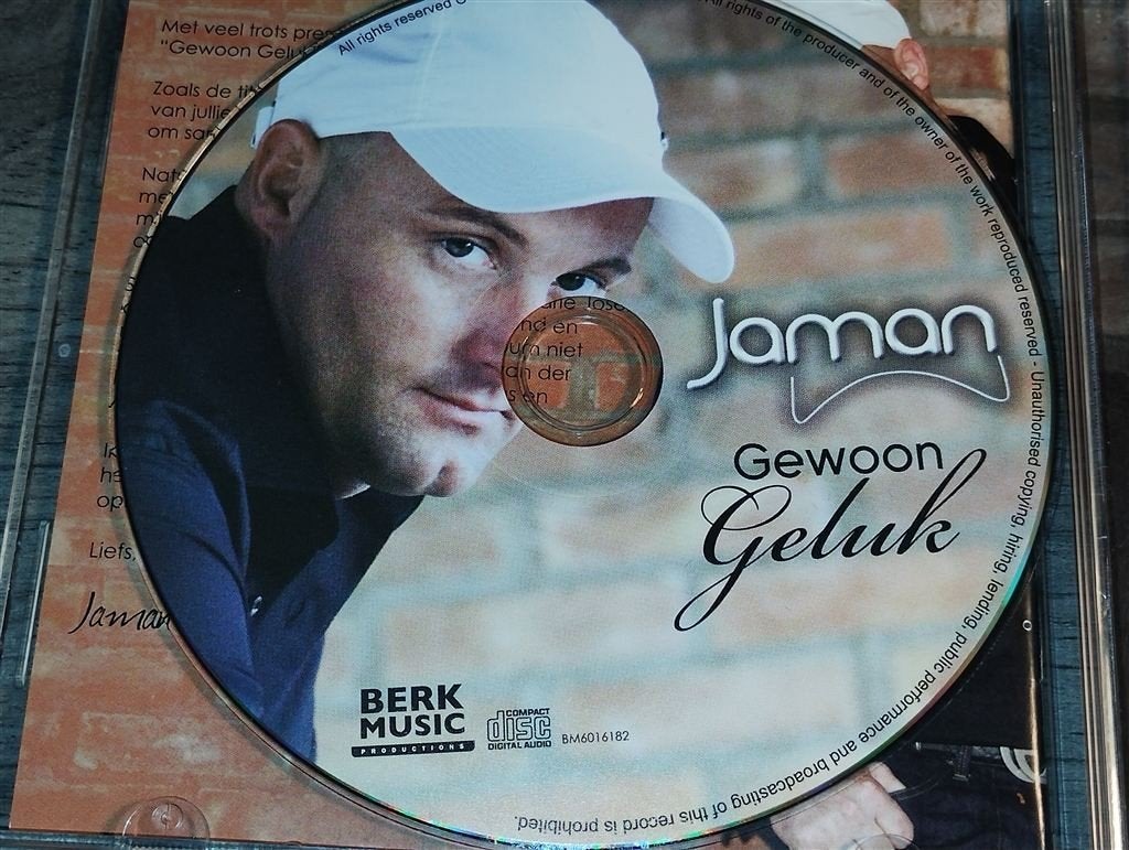 Jaman - Gewoon Geluk, Ophalen of Verzenden, Zo goed als nieuw, Levenslied of Smartlap