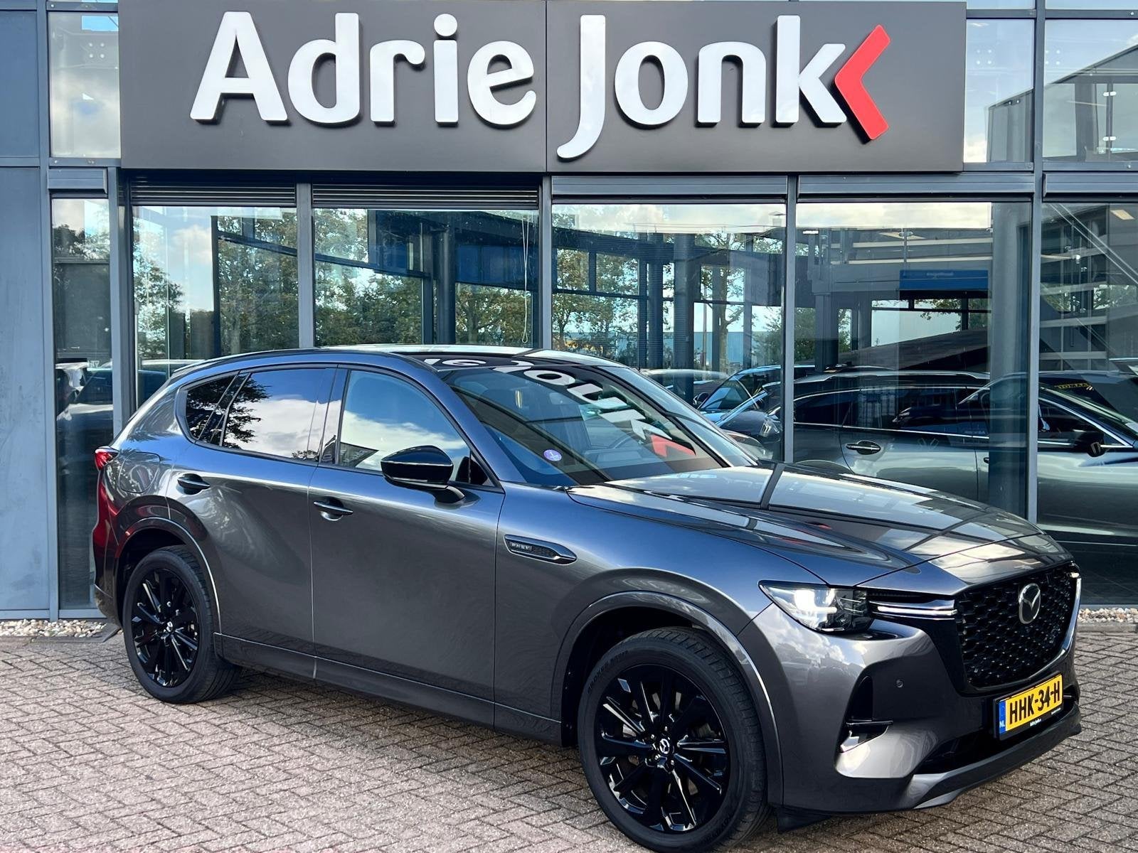 Mazda CX-60 2.5 e-SkyActiv PHEV Homura Business Edition | TR, Auto's, Automaat, Gebruikt, 4 cilinders, Met garantie (alle)