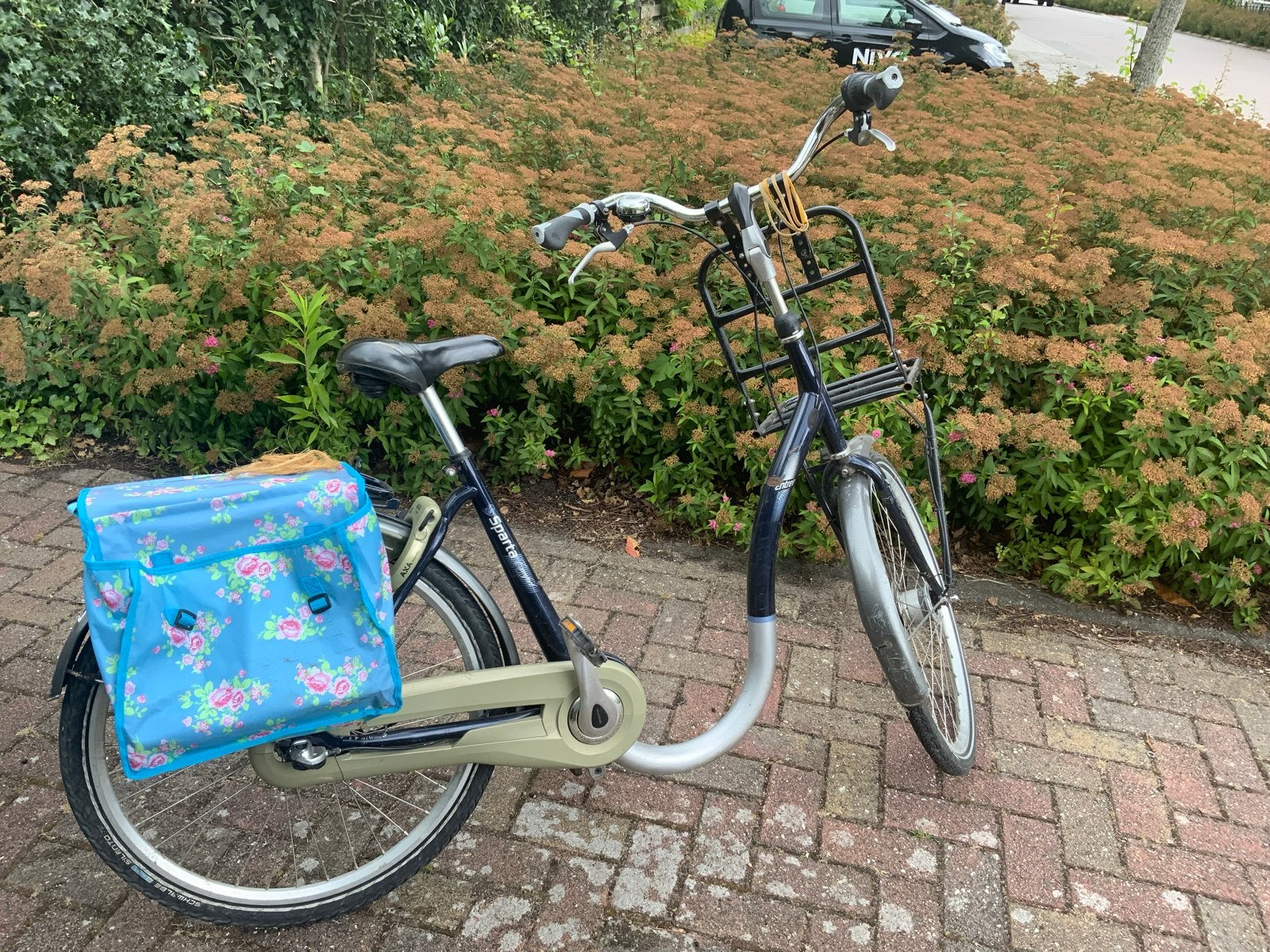 Sparta omafiets met voordrager en fietstassen, Ophalen, Terugtraprem, Sparta, Versnellingen