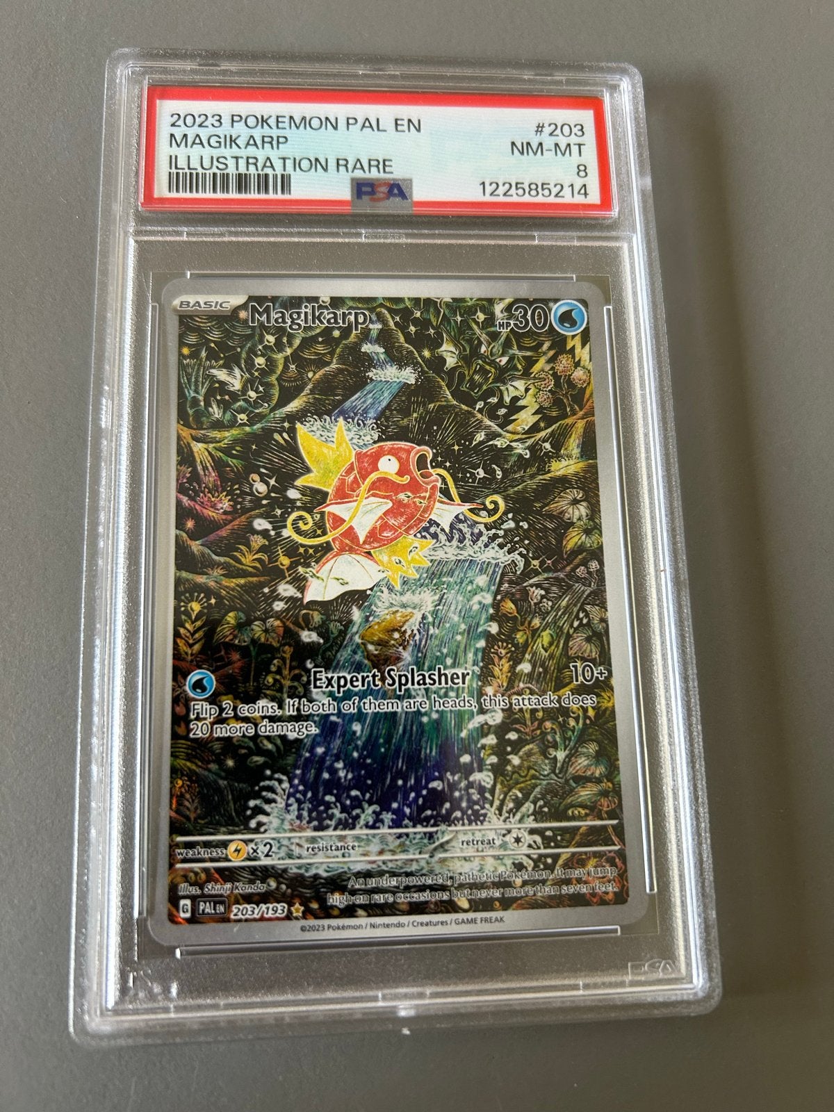 Magikarp 203 - paldea evolved - PSA 8 - pokemon kaart, Ophalen of Verzenden, Zo goed als nieuw, Losse kaart