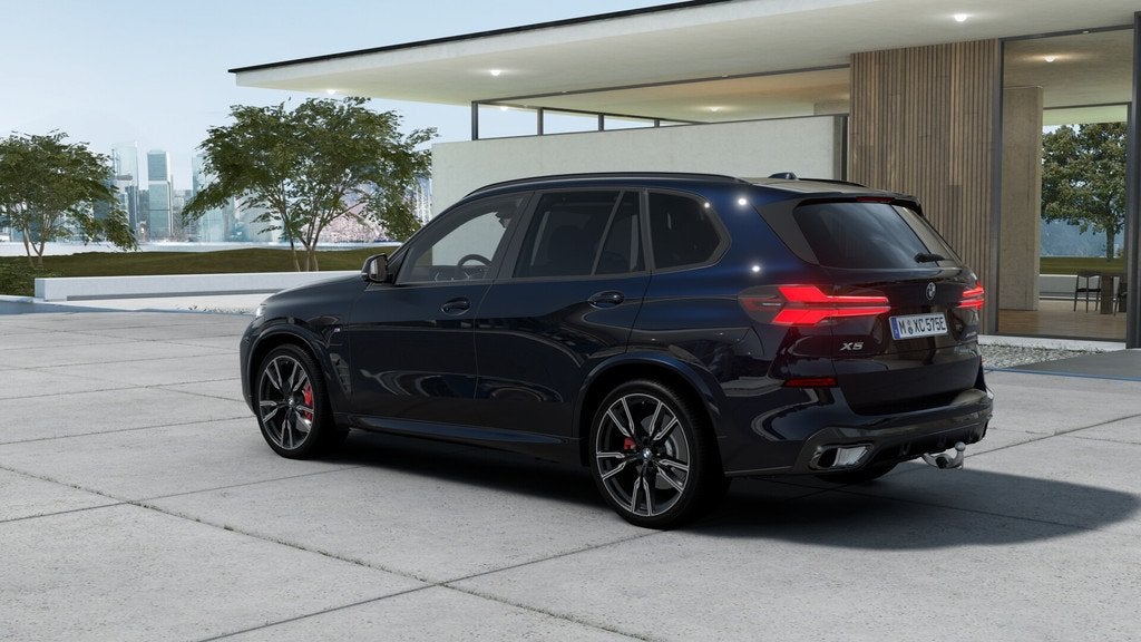 BMW X5 xDrive50e M Sport Automaat / Panoramadak / Trekhaak /, Auto's, BMW, Automaat, X5, 2395 kg, Zwart