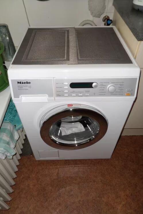 Wasmachine - Miele SoftCare System V5849 WPS - 7 kg, Ophalen, Zo goed als nieuw, Voorlader, 85 tot 90 cm