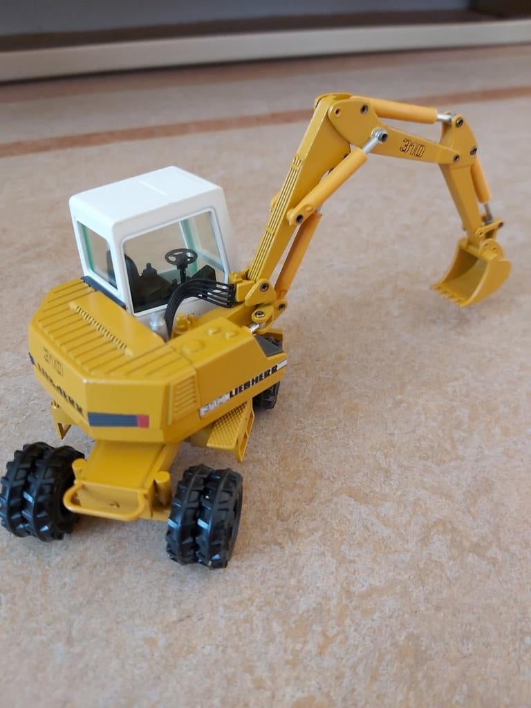 Liebherr A310 hydr.  mobiele graafmachine Conrad 1/50 in OVP, Hobby en Vrije tijd, Modelauto's | 1:50, Ophalen of Verzenden, Nieuw