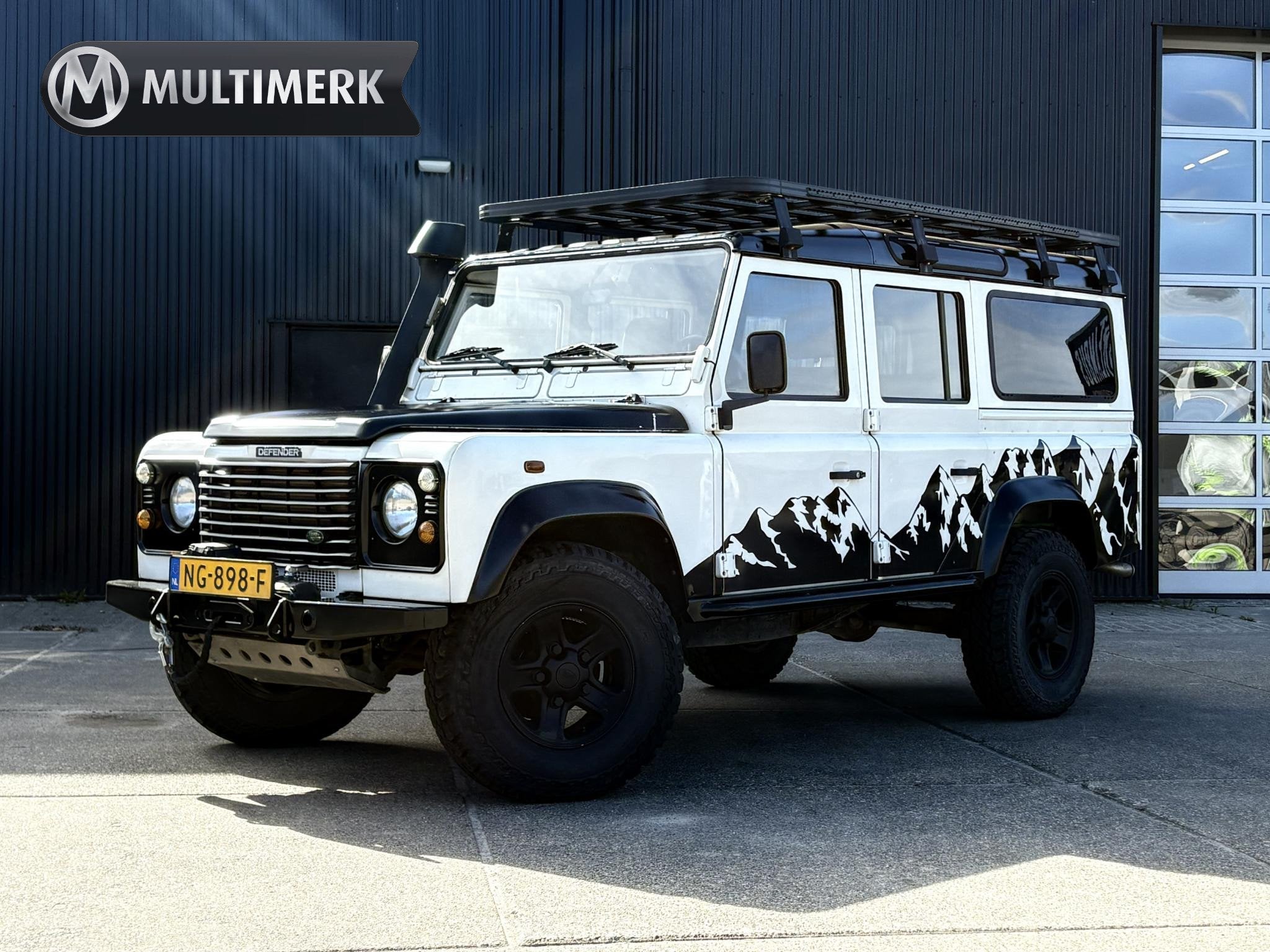 Land Rover Defender 2.5 TD5 110 SAFARI | GRIJS KENTEKEN 2P |, Auto's, Stof, Bedrijf, Vierwielaandrijving, 2 stoelen