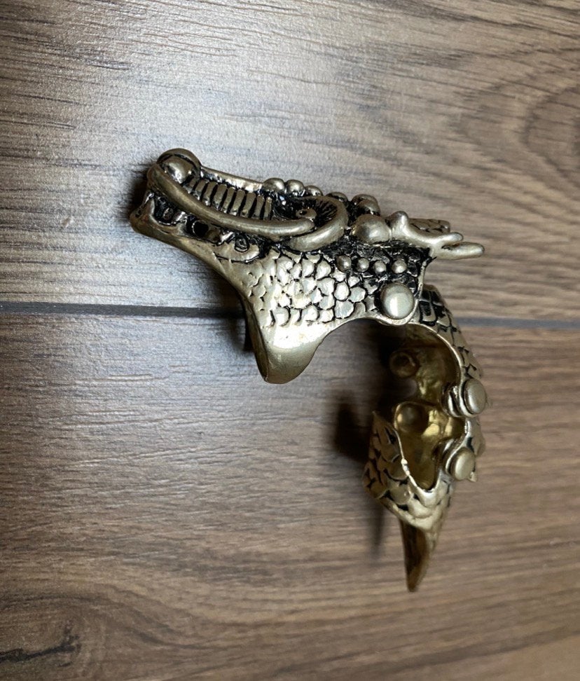 Draak vinger ring. Gehele vinger, Overige materialen, Ophalen of Verzenden, Zo goed als nieuw, Dame of Heer