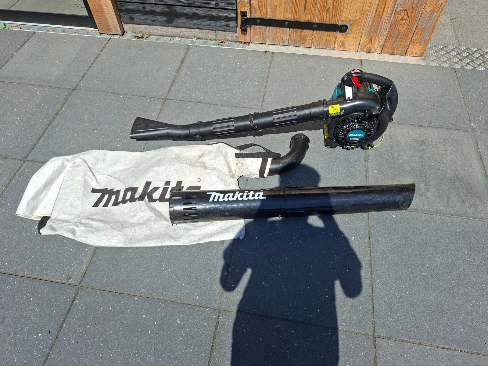 Makita BHX2501, Tuin en Terras, Bladblazers, Ophalen, Benzine, Met opvangzak, Handgedragen