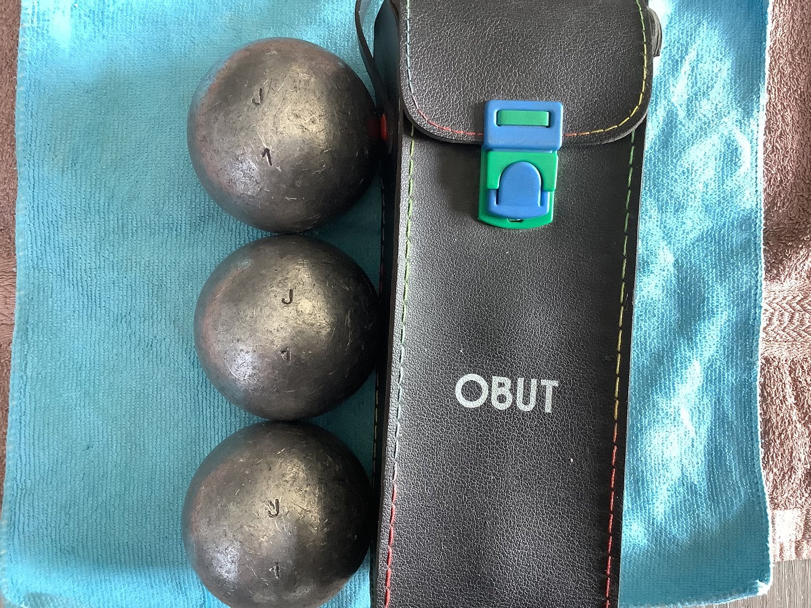 Jeu de boules ballen twee sets Obut zie foto’s, Ophalen, Zo goed als nieuw