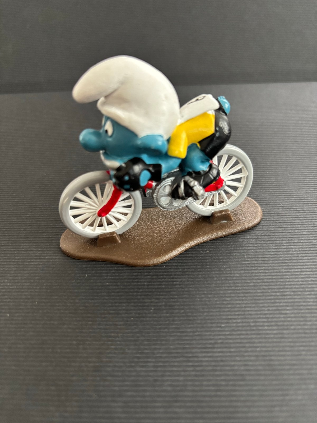 Zeldzame wielrenner Smurf Vintage jaren 70, Verzamelen, Ophalen of Verzenden, Gebruikt, Overige Smurfen, Poppetje, Figuurtje of Knuffel