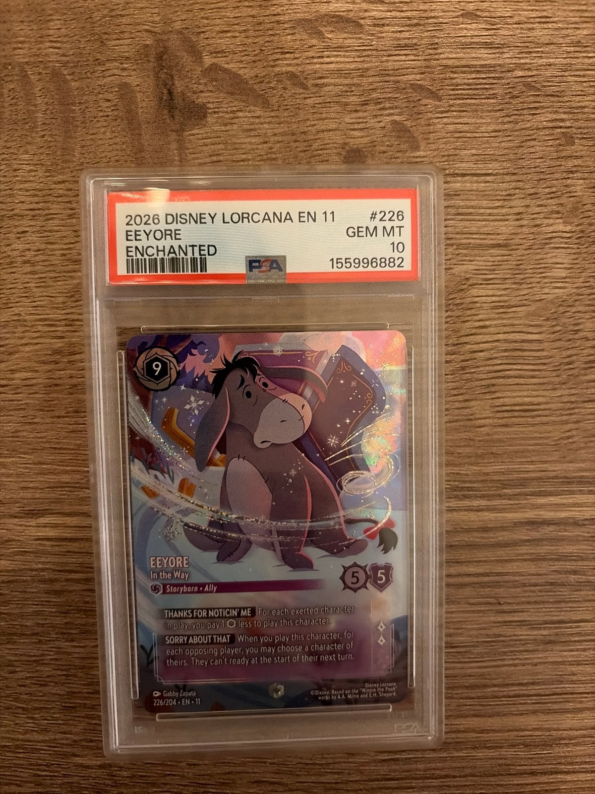 Disney Lorcana Winterspell Eeyore Enchanted PSA 10 GEM MT, Ophalen of Verzenden, Zo goed als nieuw, Losse kaart, Foil