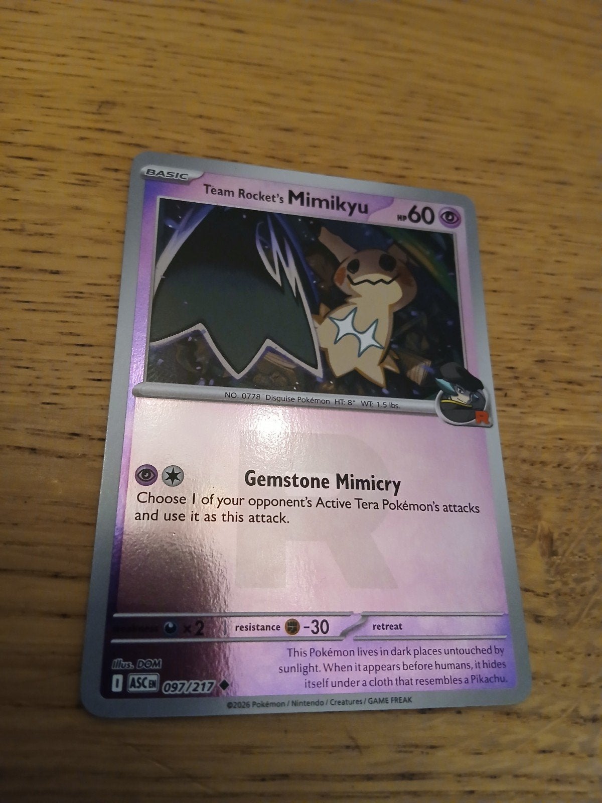 Team Rocket's Mimikyu Pokémon Kaart 097/217, Ophalen of Verzenden, Zo goed als nieuw, Losse kaart