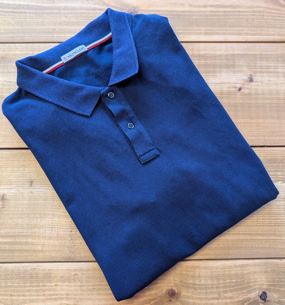 Moncler Polo Shirt Maat L, Ophalen of Verzenden, Zo goed als nieuw, Maat 52/54 (L), Blauw