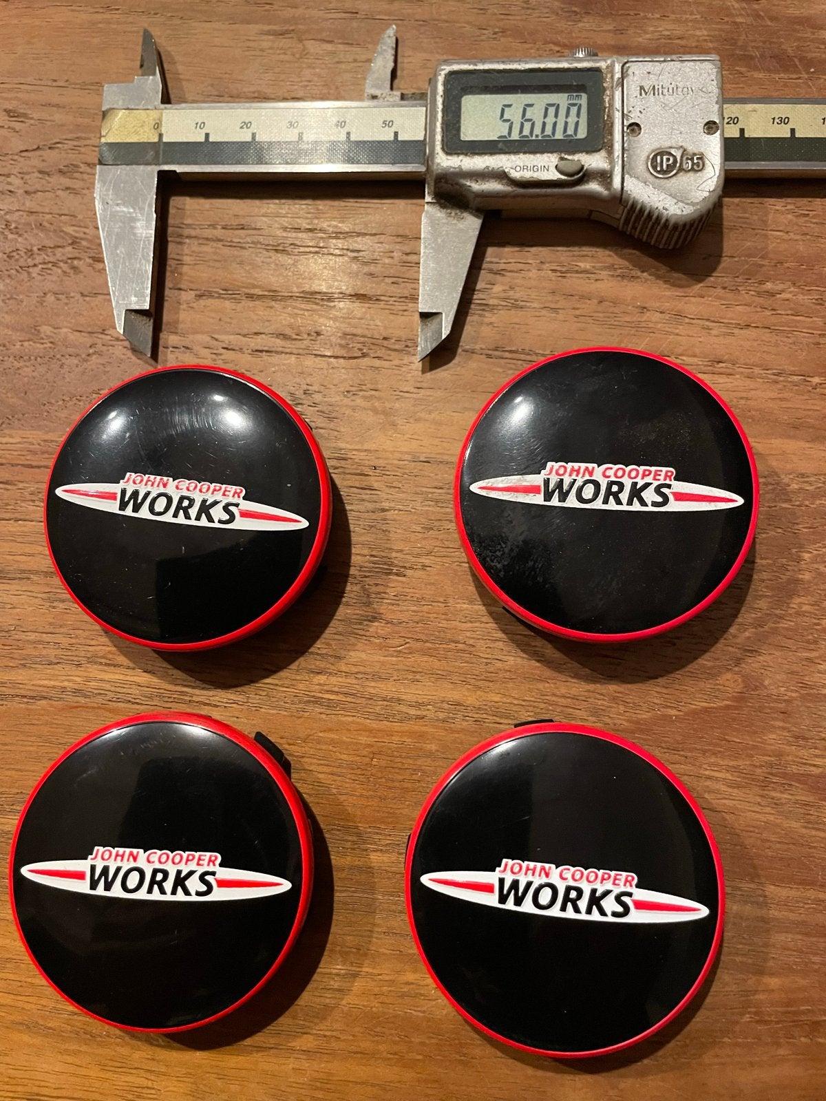 56mm Zwarte John Cooper Works Naafdoppen (4 stuks), Auto diversen, Wieldoppen, Ophalen of Verzenden, Gebruikt