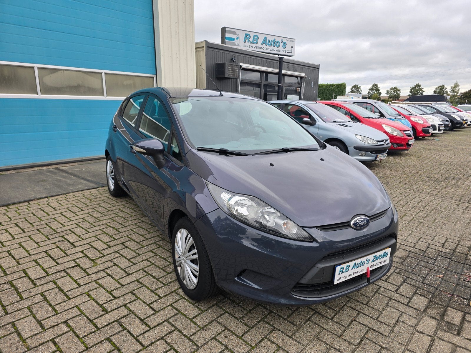 Ford Fiësta 1.25 44KW 5DR 2011 Grijs, Voorwielaandrijving, Stof, 40 €/maand, 4 cilinders
