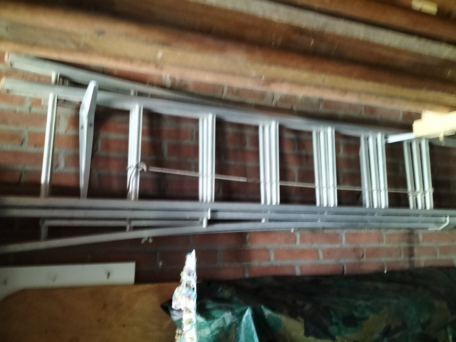 Uitschuifbare ladder 3 x 7 treden, Ophalen