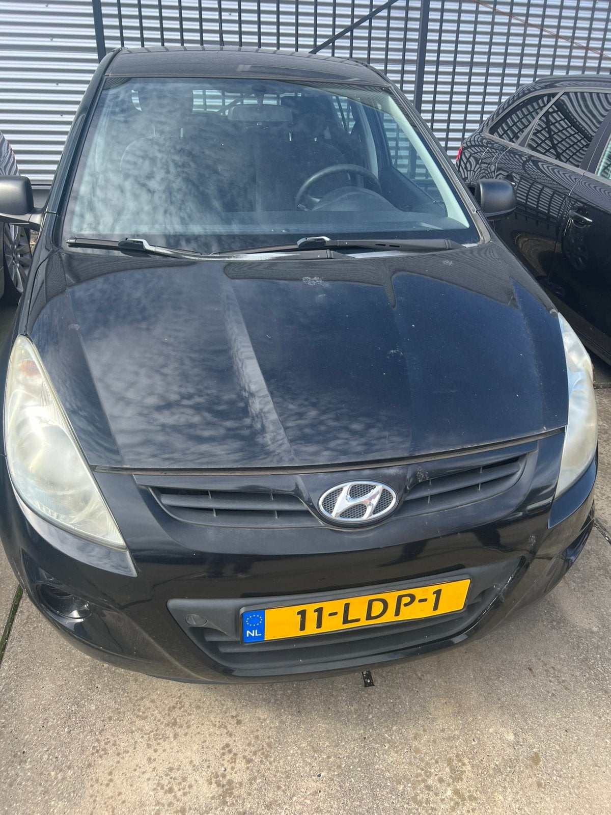 Hyundai i20 1.2 5-DRS 2010 Zwart, Auto's, 450 kg, 31 €/maand, 4 cilinders, Zwart
