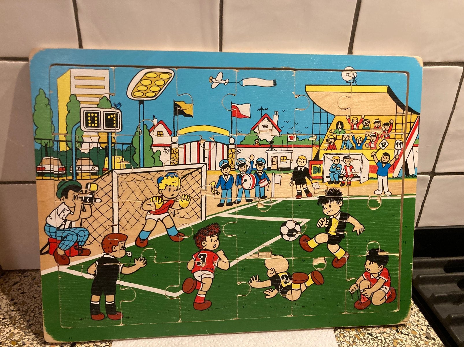 Oude puzzel voetbal, Antiek en Kunst, Ophalen of Verzenden