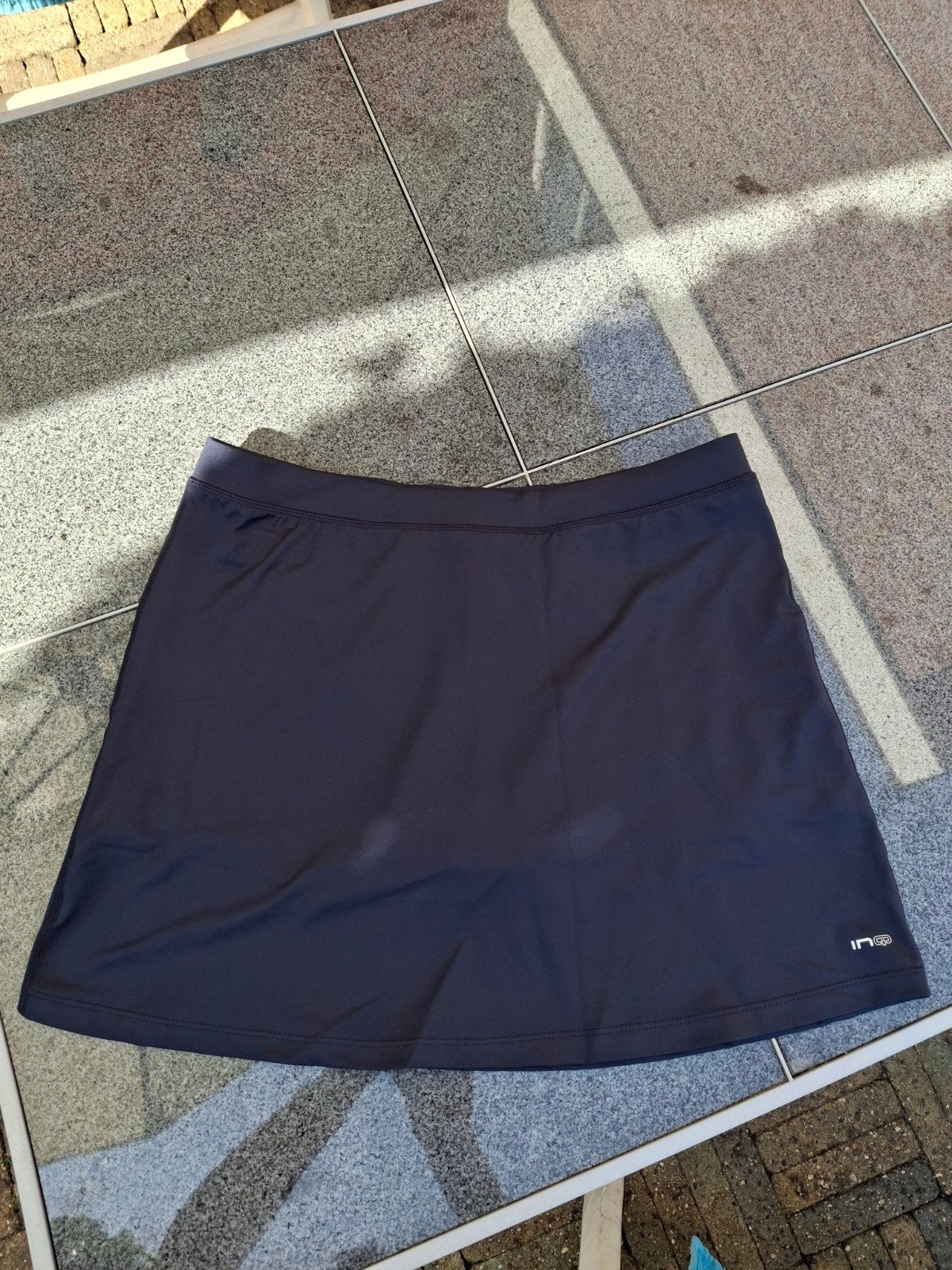 Donkerblauwe sportrok met binnenbroekje, maat L, Kleding | Dames, INQ, Ophalen of Verzenden, Zo goed als nieuw, Blauw