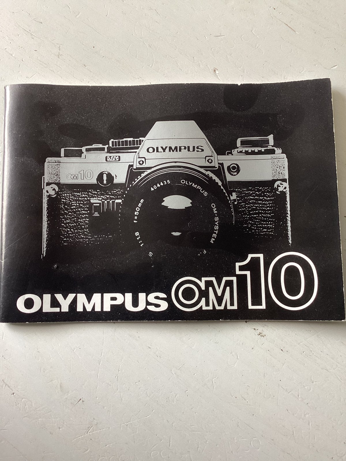 Gebruiksaanwijzing Olympus OM10 (fotografie), Verzenden, Zo goed als nieuw, Folder