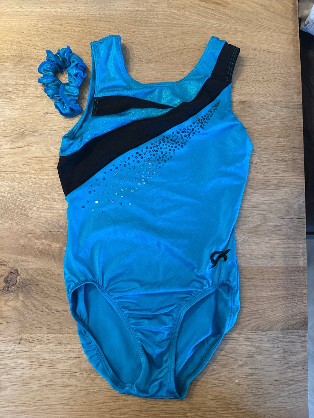 Aqua glitter turnpakje - 55 cm, Overige kleuren, Ophalen of Verzenden, Zo goed als nieuw, Turnpak(je)