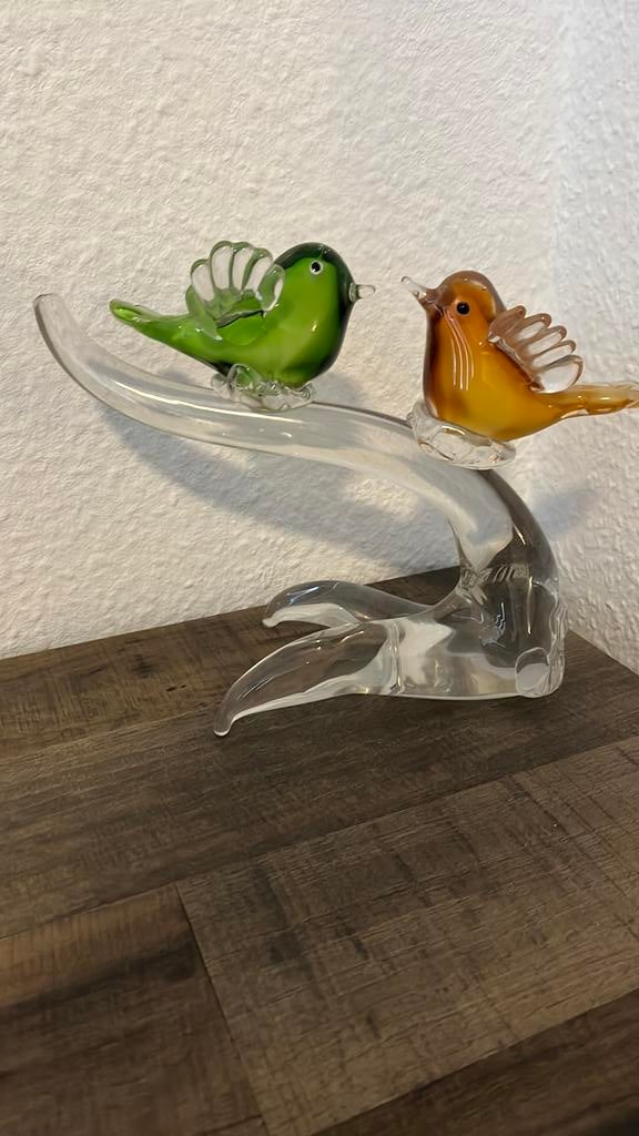 Vogels op boomstam, Ophalen