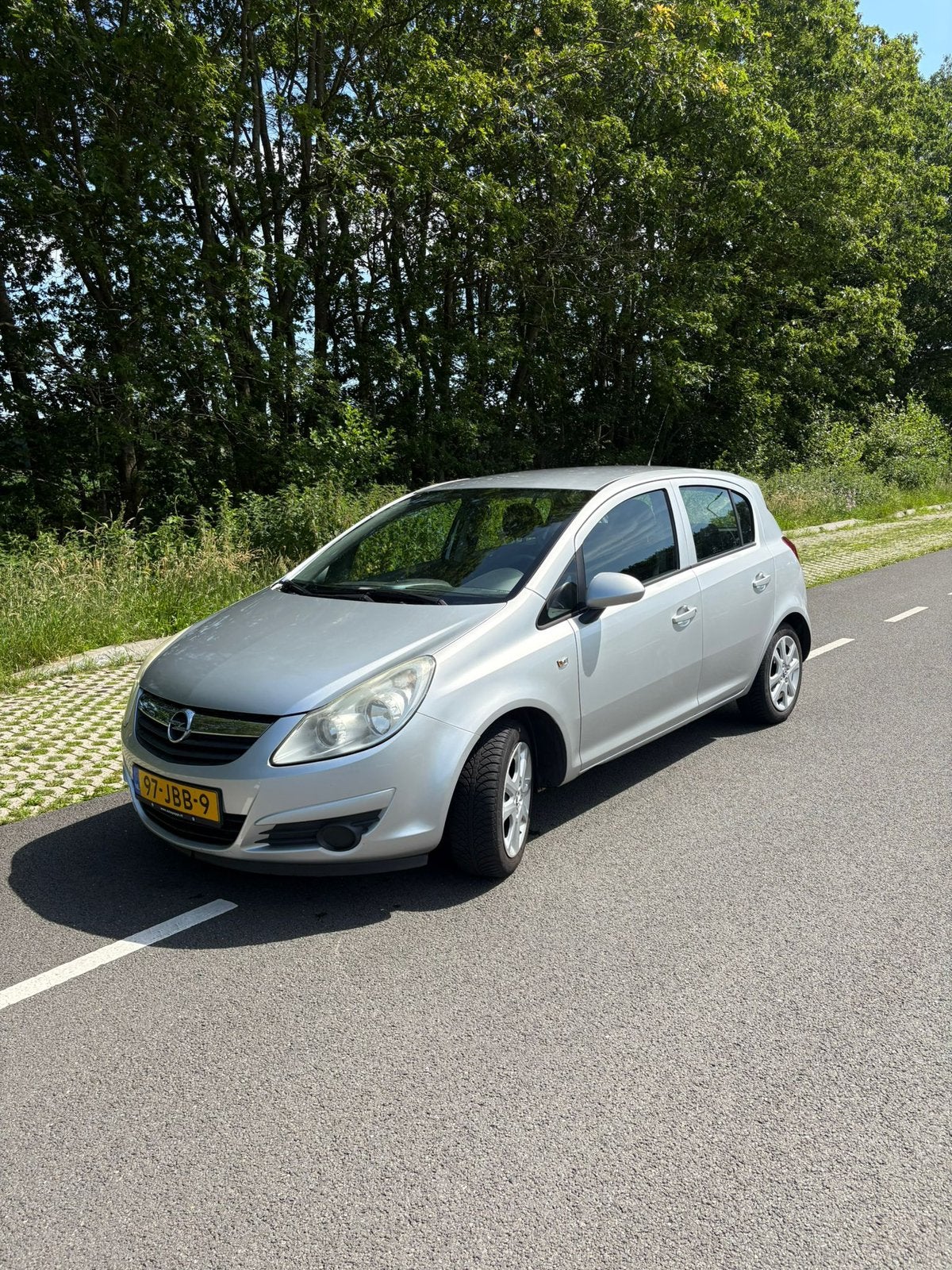 Opel Corsa 1.0 12V 5D 2009 Grijs, Auto's, Voorwielaandrijving, 40 €/maand, 1045 kg, Origineel Nederlands