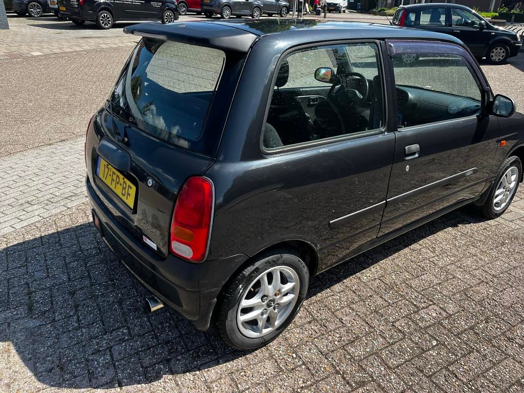 Daihatsu Cuore 1.0 40KW 2000 Zwart, Voorwielaandrijving, 18 €/maand, 4 stoelen, Cuore
