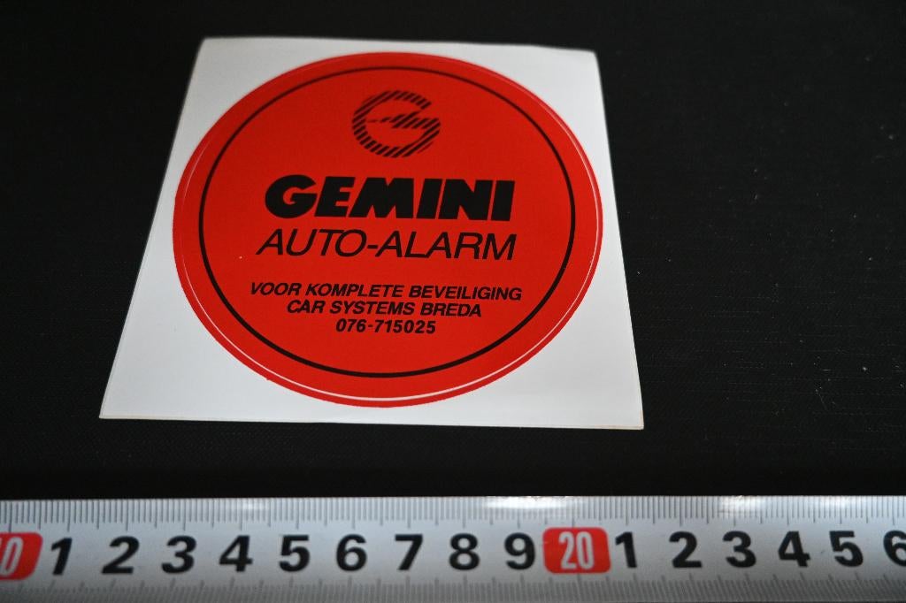sticker Breda GEMI auto alarm  Car systems  076-715025, Ophalen, Zo goed als nieuw