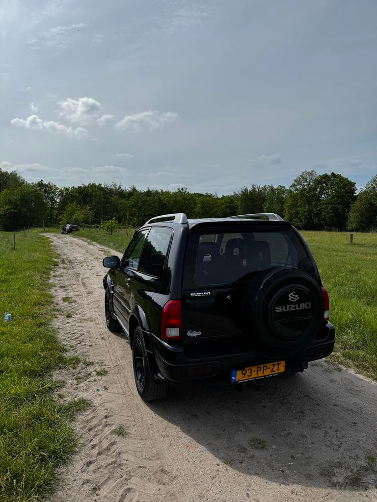 Suzuki Grand Vitara 1.6 3D 2004 Zwart, Auto's, 13 km/l, Zwart, Zwart, Handgeschakeld
