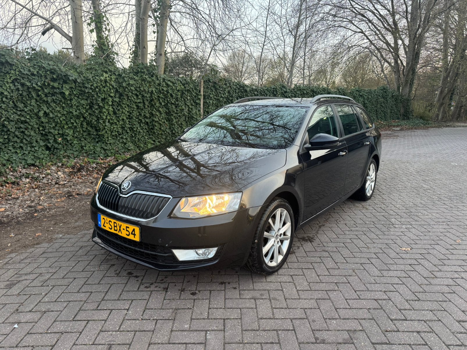 Skoda Octavia 1.6 TDI 77KW Combi 2013 Zwart, Auto's, Voorwielaandrijving, Stof, Zwart, 4 cilinders