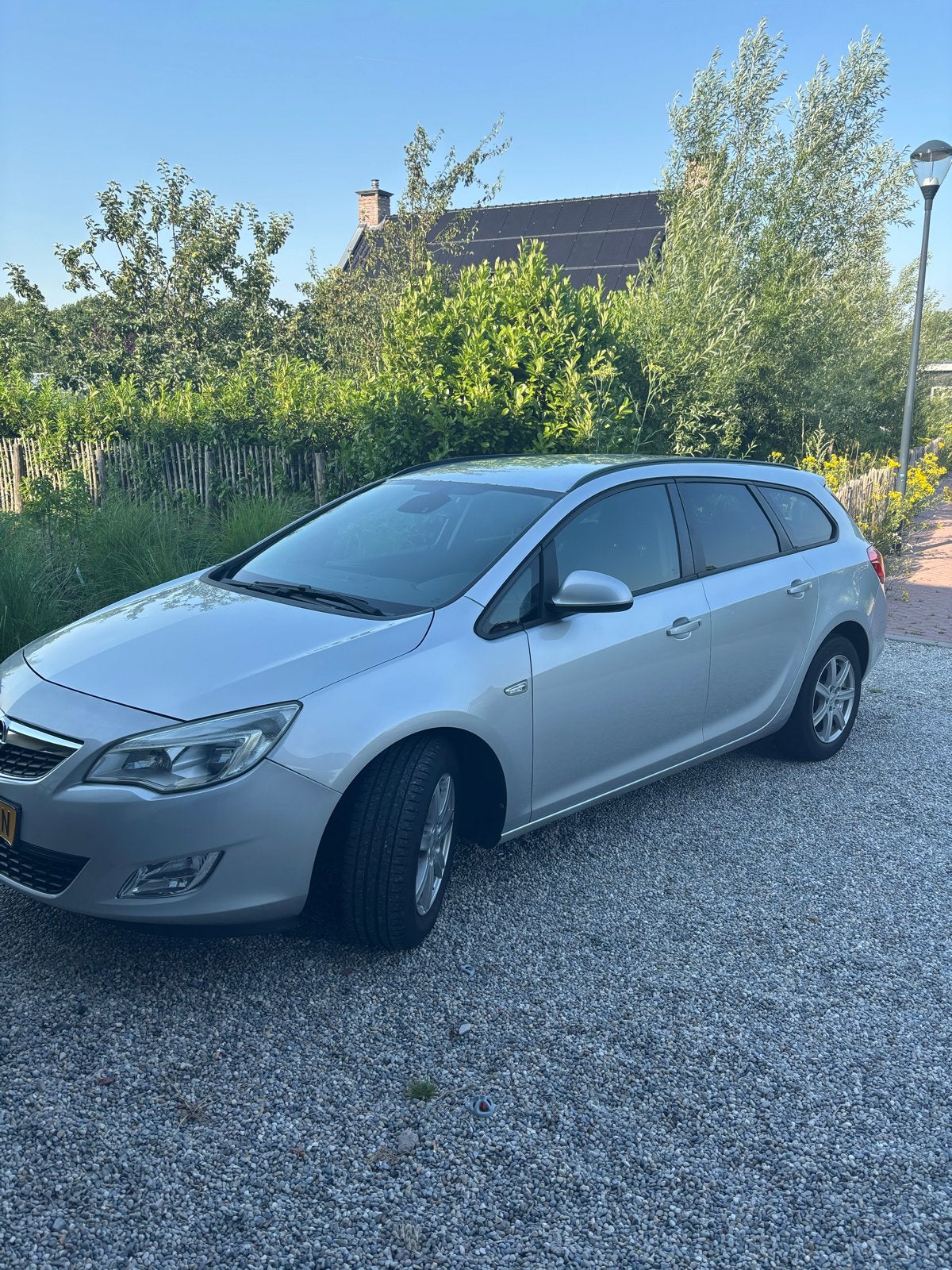 Opel Astra 1.4 Turbo 88KW Sports Tourer 2011 Grijs, Auto's, Voorwielaandrijving, 4 cilinders, 1337 kg, Handgeschakeld