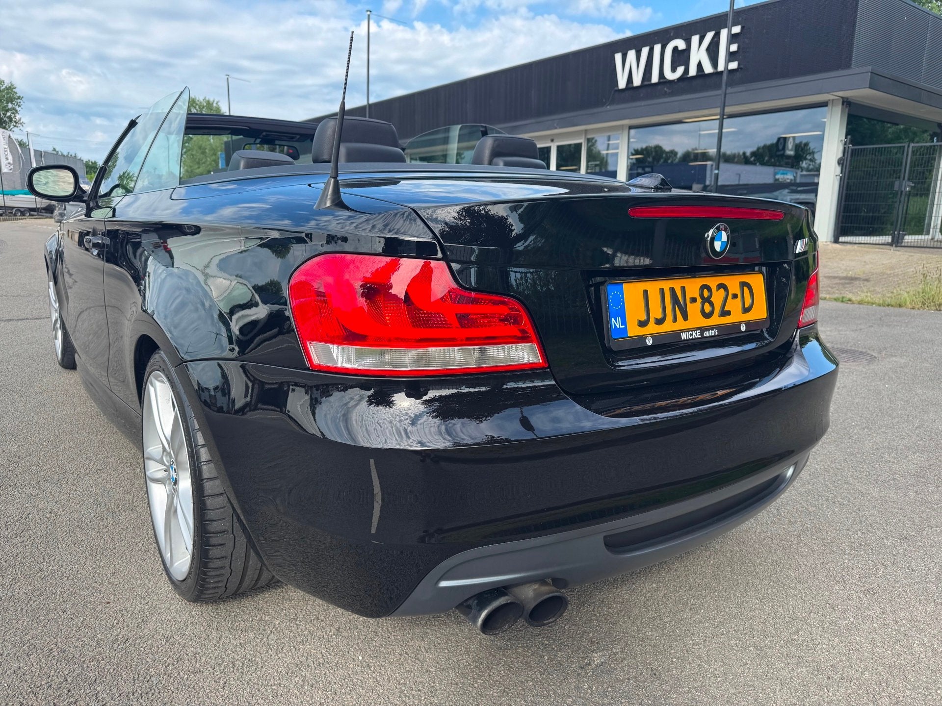 BMW 1-serie M135i xDrive High Executive Cabriolet AUT Leder, Auto's, Euro 5, Gebruikt, Zwart, Cabriolet