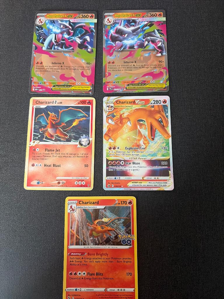 5 x charizard, Ophalen of Verzenden, Zo goed als nieuw