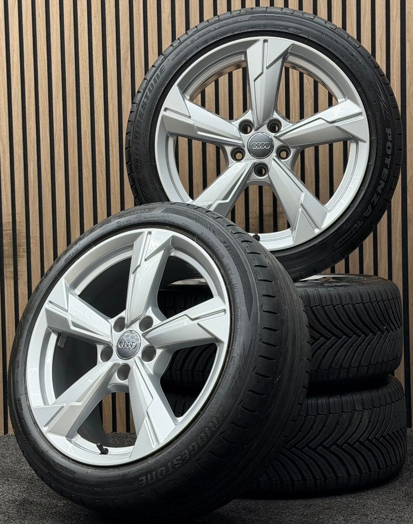 Originele 18 inch Audi A4 B9 5x112 ET39 66.5 Bridgestone, Ophalen, 18 inch, ., Banden en Velgen