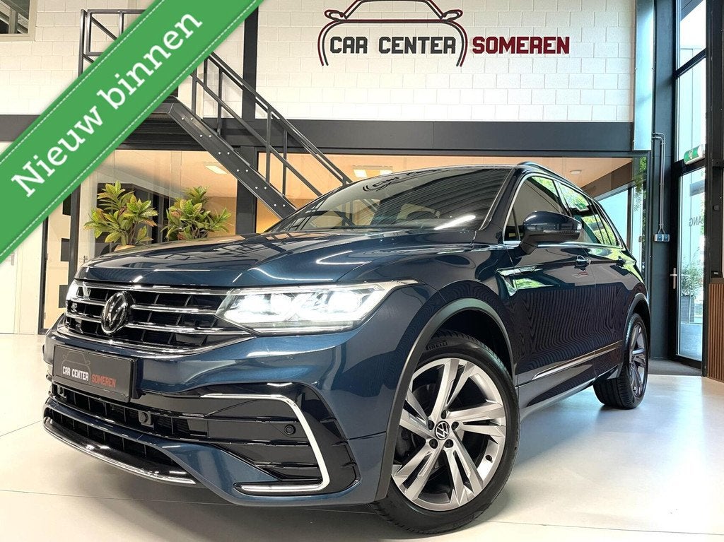 Volkswagen Tiguan 1.5 TSI R-Line/ Cam/ IQ LED/ CarPlay/ Trek, Auto's, 15 km/l, 1498 cc, 4 cilinders, Blauw