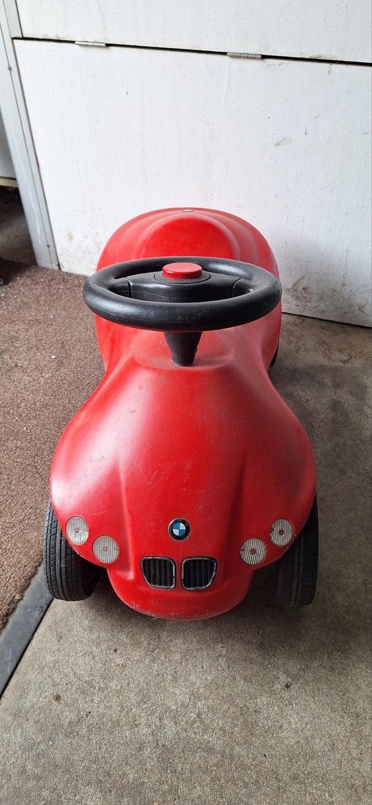 BMW loopauto, rood van kleur., Kinderen en Baby's, Speelgoed | Buiten | Voertuigen en Loopfietsen, Ophalen, Gebruikt, Loopvoertuig
