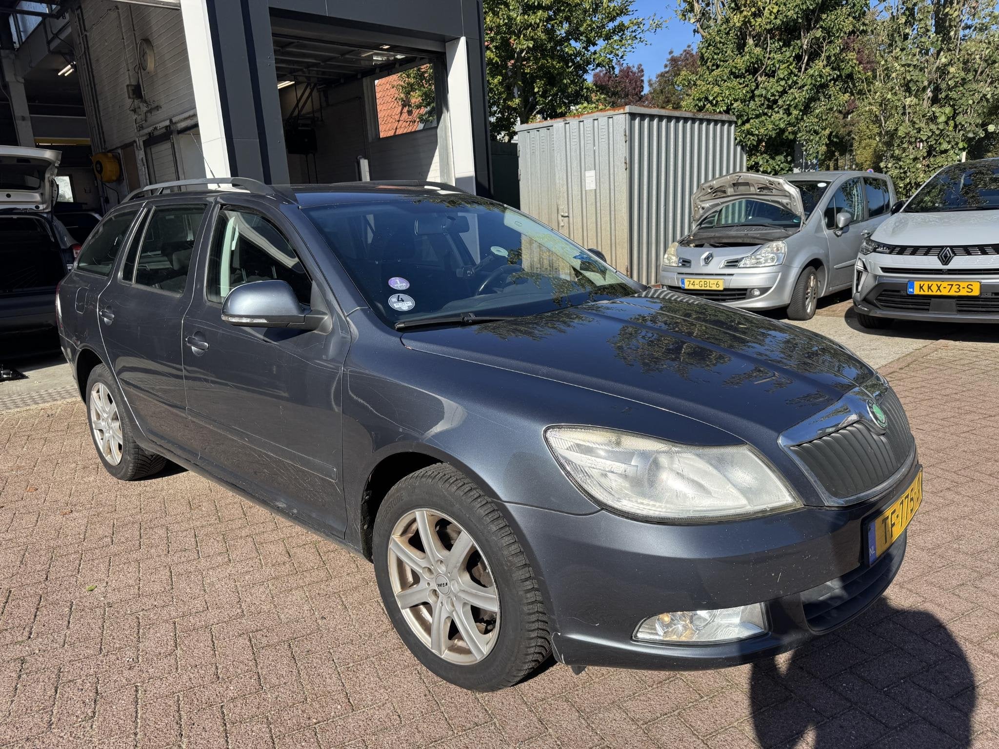 Skoda Octavia Combi 1.4 TSI Ambition, Auto's, Euro 5, Stof, Gebruikt, 4 cilinders