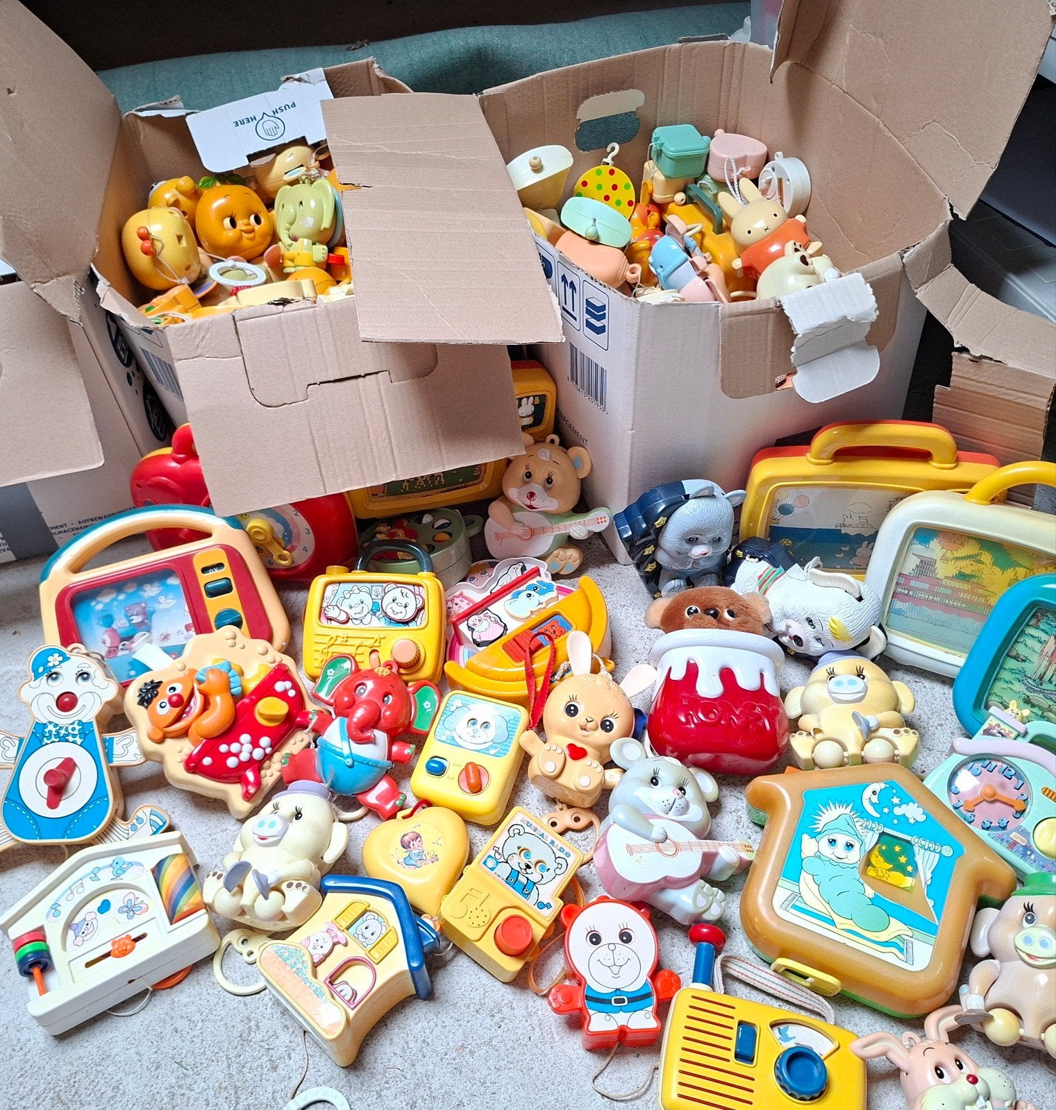 Grote partij vintage babyspeelgoed - rammelaars, mobielen, Kinderen en Baby's, Ophalen, Gebruikt, Overige typen, Met geluid